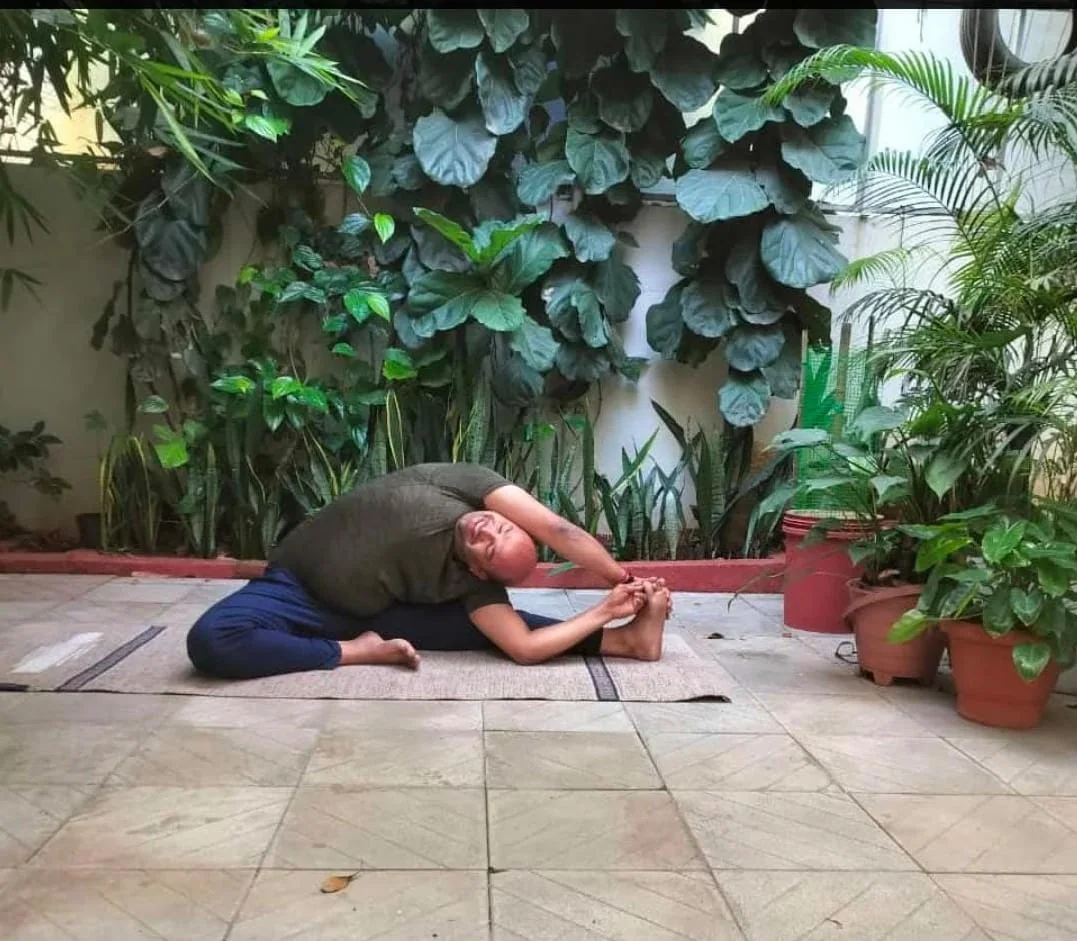 Thasmaisri Yoga instructor practicing yoga outdoors